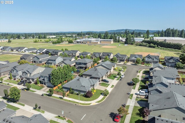1059 S Walnut St, Canby, OR 97013 - aerial perspective of suburban area featuring a mountainous background