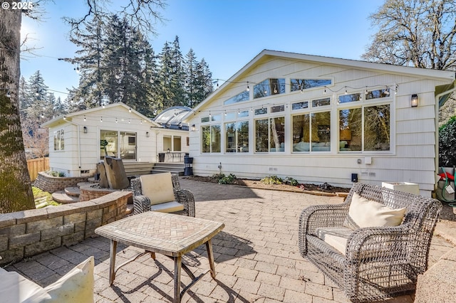 back of house featuring a patio area