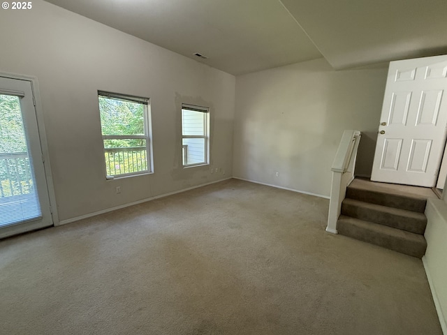 15680 SW Talus Way, Beaverton, OR 97007 - carpeted spare room with baseboards and stairway