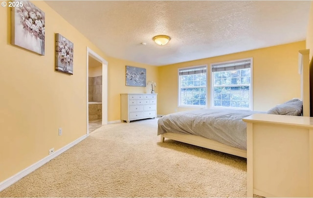 5706 SW Hamilton St, Portland, OR 97221 - bedroom featuring carpet, a textured ceiling, and connected bathroom