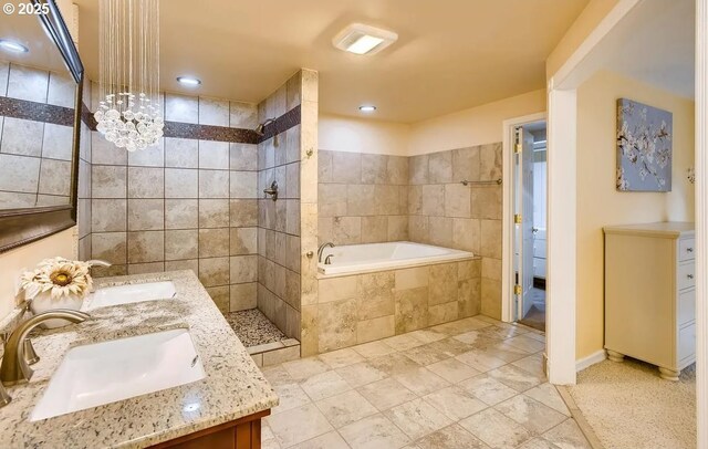 5706 SW Hamilton St, Portland, OR 97221 - bathroom with walk in shower, a garden tub, and double vanity
