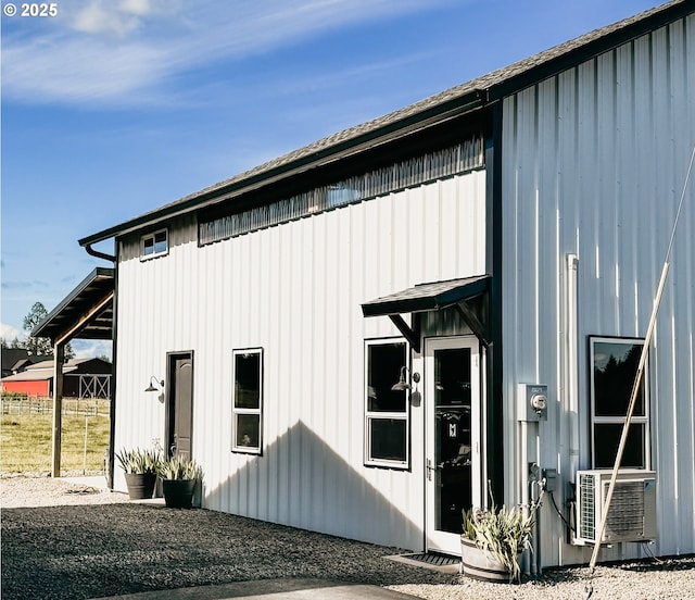 8408 NE 339th St, La Center, WA 98629 - view of side of home with board and batten siding and cooling unit