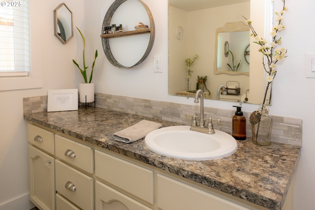 8408 NE 339th St, La Center, WA 98629 - bathroom featuring vanity and tasteful backsplash