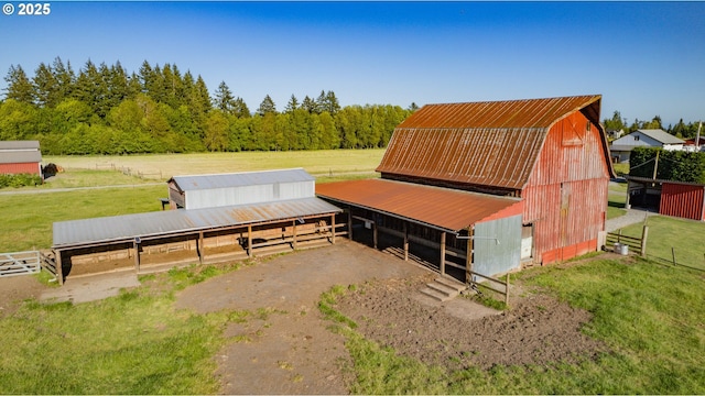 8408 NE 339th St, La Center, WA 98629 - view of front of house with an exterior structure, an outdoor structure, a gambrel roof, and a metal roof