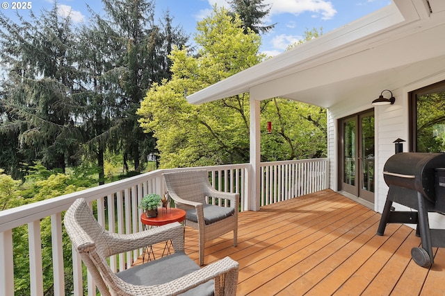 wooden terrace featuring french doors