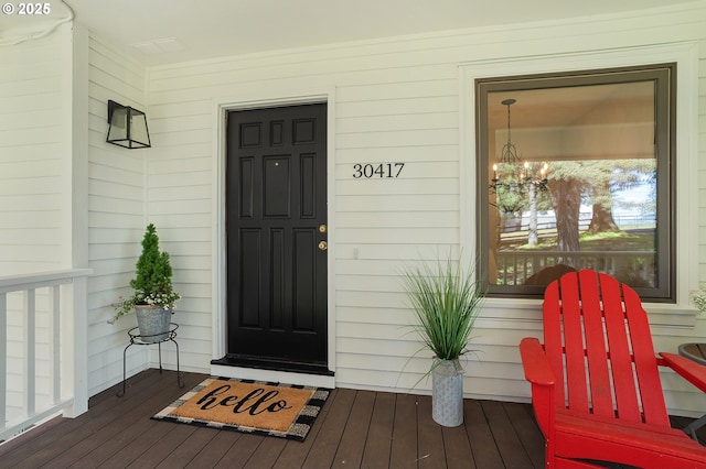 entrance to property featuring a porch