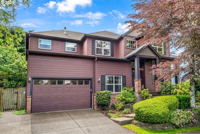 3140 Sabo Ln, West Linn, OR 97068 - view of front of house with concrete driveway, a garage, and brick siding