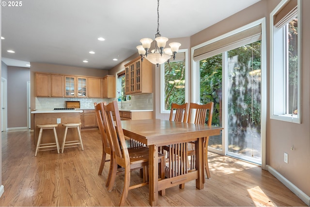 3140 Sabo Ln, West Linn, OR 97068 - dining area with a chandelier, light wood-style flooring, recessed lighting, and baseboards