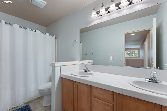 3140 Sabo Ln, West Linn, OR 97068 - full bathroom featuring toilet, double vanity, tile patterned floors, curtained shower, and recessed lighting