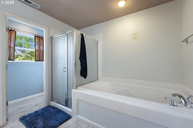 3140 Sabo Ln, West Linn, OR 97068 - full bathroom with a bath, a shower stall, and wood finished floors