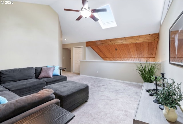 1425 SE 96th Ave, Vancouver, WA 98664 - carpeted living room with lofted ceiling, ceiling fan, a skylight, and baseboards