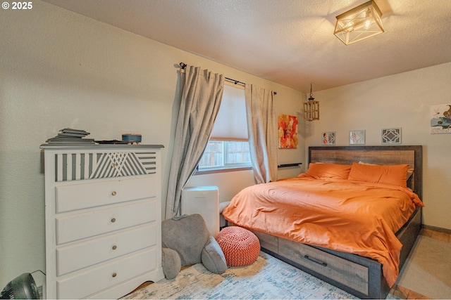 bedroom with a textured ceiling