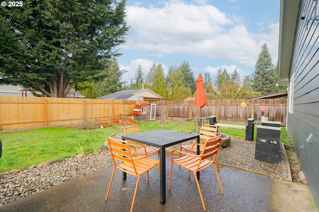 view of patio / terrace with outdoor dining area and a fenced backyard