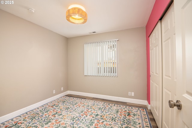 5419 Baden Way, Eugene, OR 97402 - unfurnished bedroom with a closet and wood finished floors