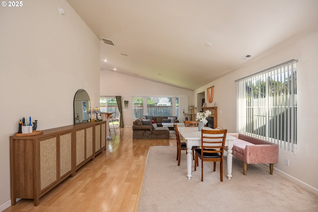 5419 Baden Way, Eugene, OR 97402 - dining area featuring healthy amount of natural light, light wood finished floors, recessed lighting, and high vaulted ceiling