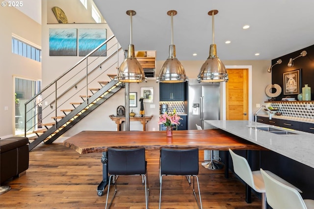 23586 NW St Helens Rd Unit U12, Portland, OR 97231 - dining space featuring stairway, recessed lighting, and hardwood / wood-style floors