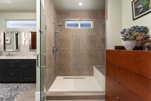 23586 NW St Helens Rd Unit U12, Portland, OR 97231 - full bath featuring tiled shower, vanity, tile patterned floors, and recessed lighting