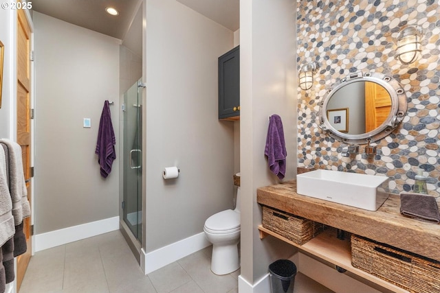 23586 NW St Helens Rd Unit U12, Portland, OR 97231 - full bathroom with baseboards, a shower stall, tile patterned floors, toilet, and recessed lighting