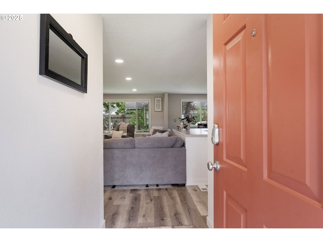foyer with recessed lighting and light wood-style flooring