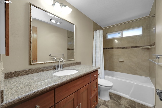 full bathroom with shower / bath combo with shower curtain, toilet, and vanity
