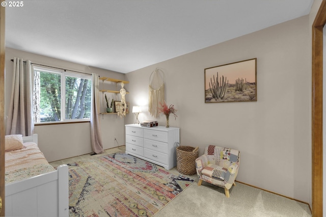 bedroom with light carpet
