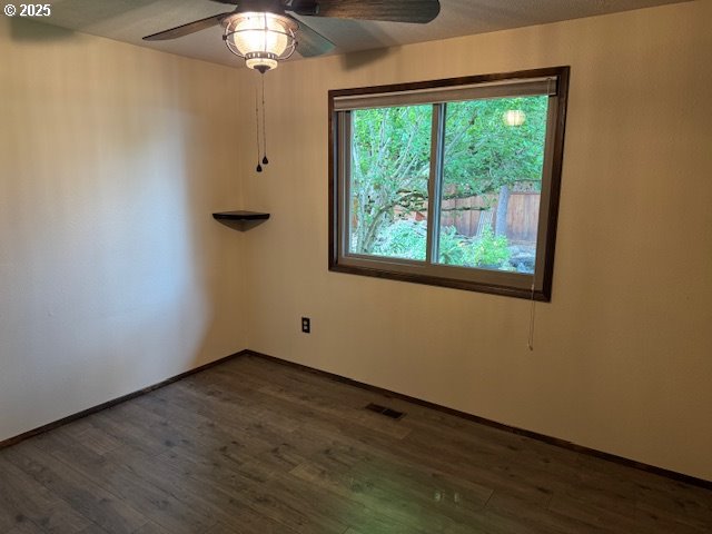18622 SE Stephens Cir, Portland, OR 97233 - spare room with ceiling fan and wood finished floors