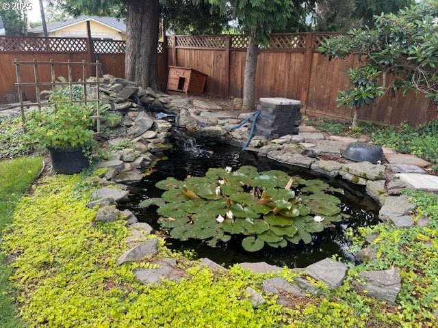 18622 SE Stephens Cir, Portland, OR 97233 - view of yard featuring a garden pond