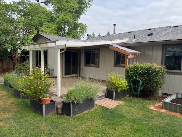 18622 SE Stephens Cir, Portland, OR 97233 - back of house with a lawn, a shingled roof, and a patio area