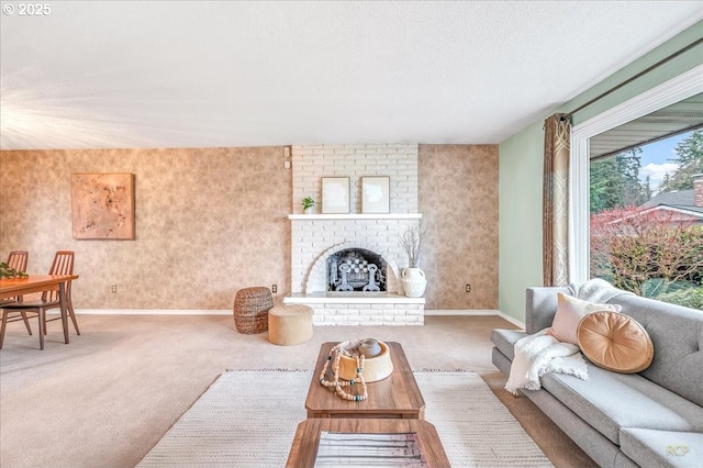 carpeted living room with a brick fireplace