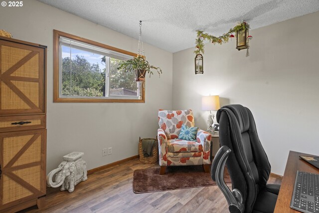 8015 NE 90th Ave, Vancouver, WA 98662 - home office featuring a textured ceiling, wood finished floors, and baseboards