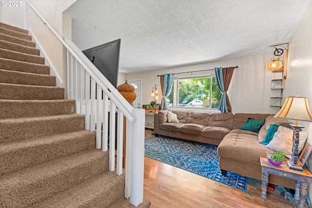 8015 NE 90th Ave, Vancouver, WA 98662 - living room with stairs, wood finished floors, and a textured ceiling