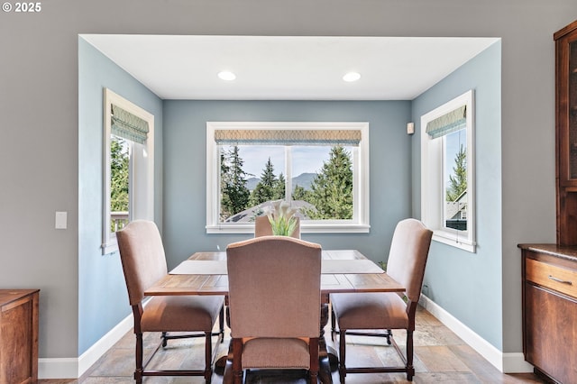 380 Mountaingate Dr, Springfield, OR 97478 - dining room with recessed lighting and light stone finish floors