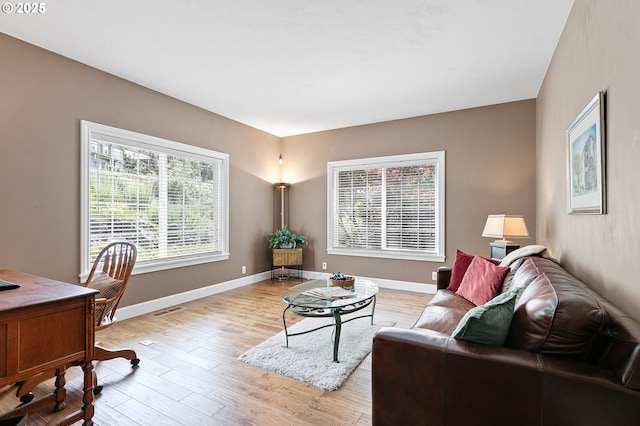 380 Mountaingate Dr, Springfield, OR 97478 - living area with light wood-style flooring and baseboards