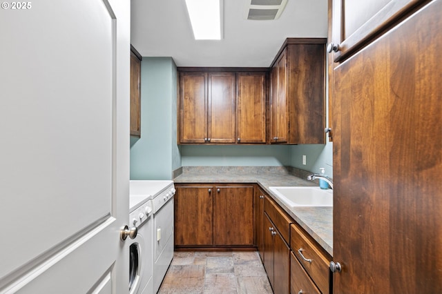 380 Mountaingate Dr, Springfield, OR 97478 - laundry area with cabinet space, stone finish floors, and washing machine and dryer