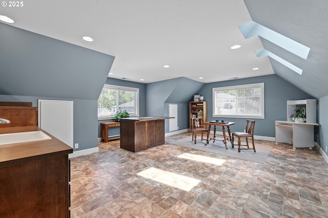 380 Mountaingate Dr, Springfield, OR 97478 - office featuring light stone finish flooring, lofted ceiling, and a skylight