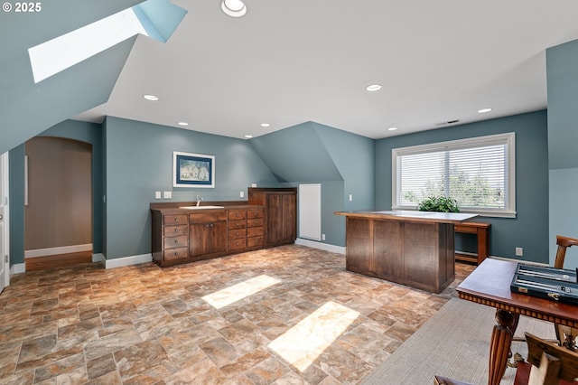 380 Mountaingate Dr, Springfield, OR 97478 - office area with a skylight, light stone finish floors, arched walkways, and recessed lighting