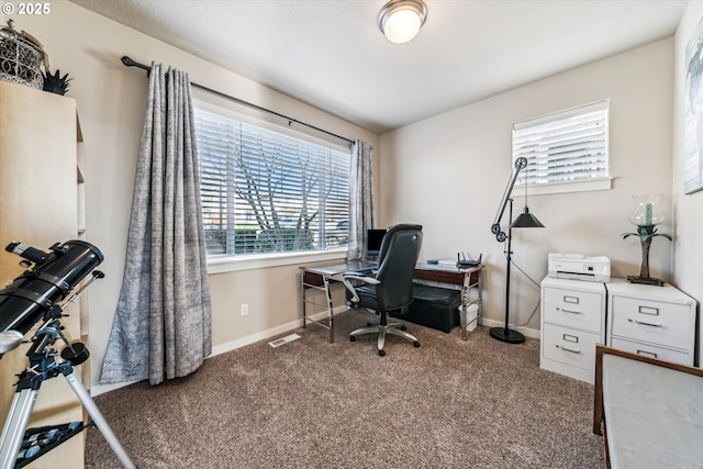 view of carpeted office space