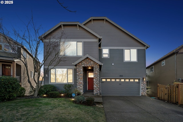 front of property with a garage and a front yard