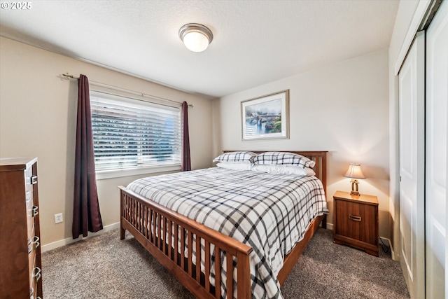 carpeted bedroom with a closet