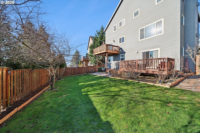 view of yard featuring a deck