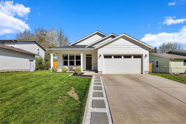 ranch-style house featuring an attached garage, a front yard, concrete driveway, and fence
