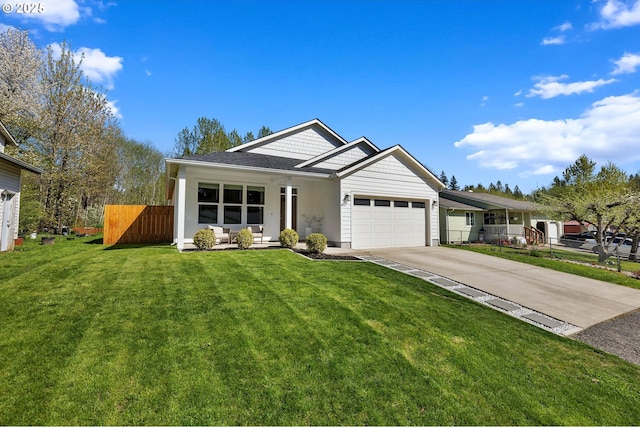 ranch-style house with a front lawn, driveway, a porch, fence, and a garage