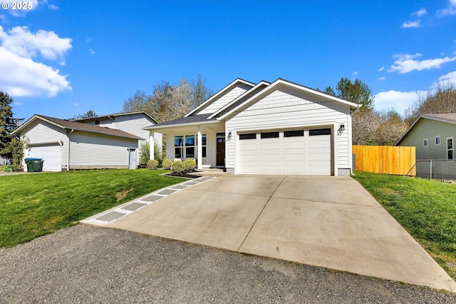 single story home with fence, an attached garage, driveway, and a front yard