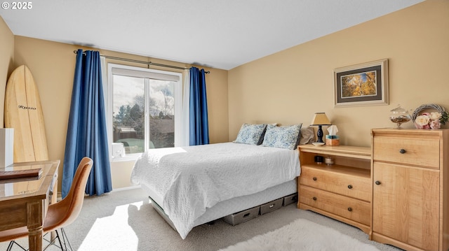 bedroom with light colored carpet