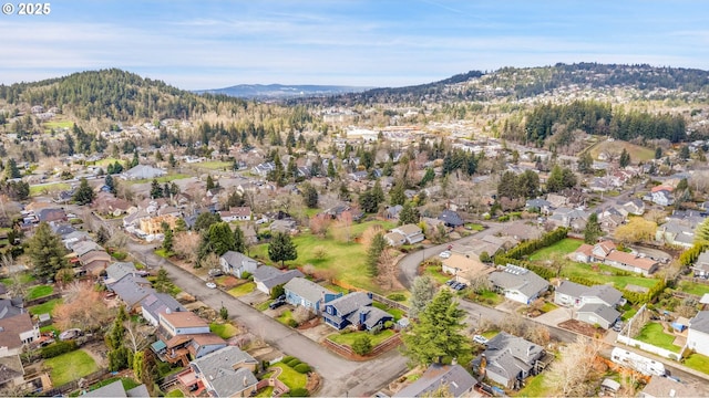 bird's eye view with a residential view and a mountain view