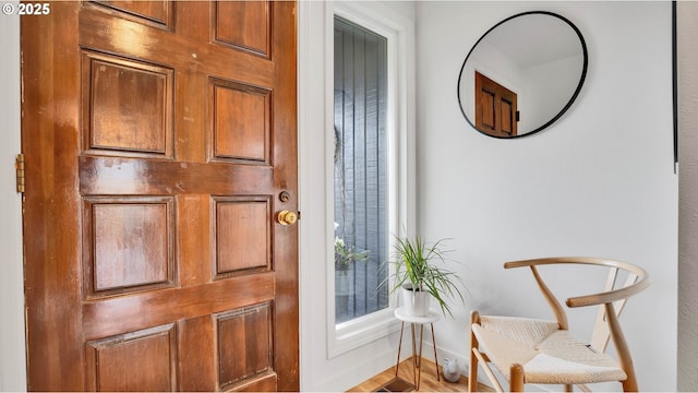 interior space featuring baseboards