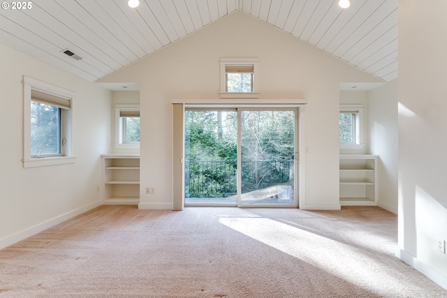 unfurnished living room with light colored carpet, lofted ceiling, and wooden ceiling