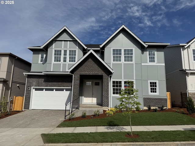 13906 SW 165th Ave, Tigard, OR 97223 - view of front of property with a garage, brick siding, concrete driveway, stucco siding, and a front lawn