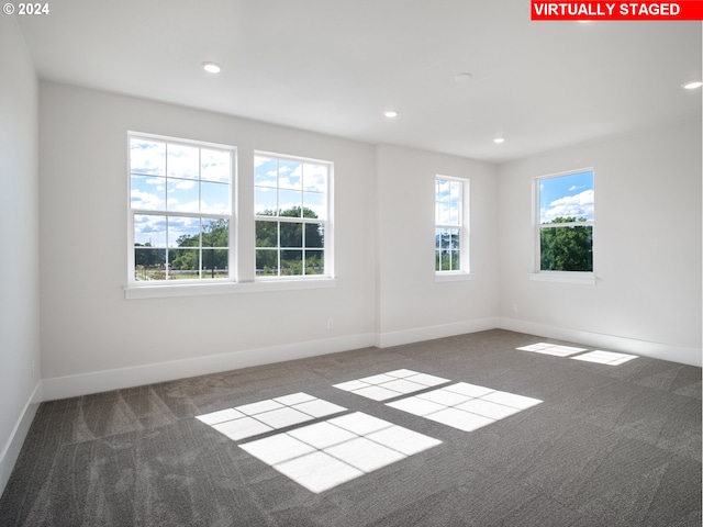 13906 SW 165th Ave, Tigard, OR 97223 - unfurnished room featuring carpet, baseboards, and recessed lighting
