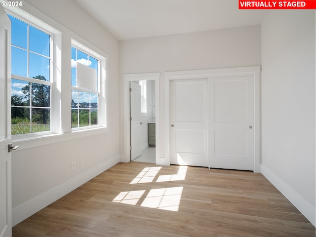 13906 SW 165th Ave, Tigard, OR 97223 - foyer entrance with light wood finished floors and baseboards